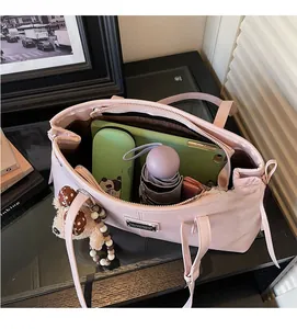Large capacity pink tote bag interior showing ample space for tablets and umbrellas