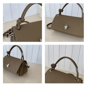 Detail view of khaki pebble leather bag with silver twist lock and knotted handle