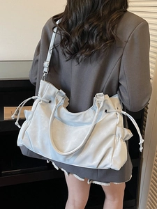 Large vintage faux leather tote bag in light grey with side drawstrings and shoulder strap