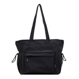 Large black nylon tote bag with drawstring sides and front flap pocket for women