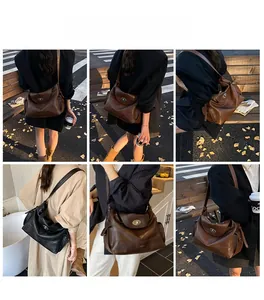 Detail shots of large oil wax leather tote bag with oval metal lock and adjustable strap