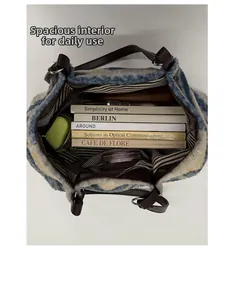 Spacious interior of fuzzy tote bag with striped lining showing daily essentials storage
