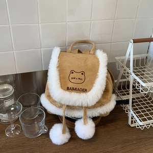 Detail of plush bucket backpack with cute cat embroidery and soft faux fur trim decor