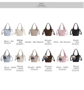 Color display of bucket bags with detachable straps and optional bear charms