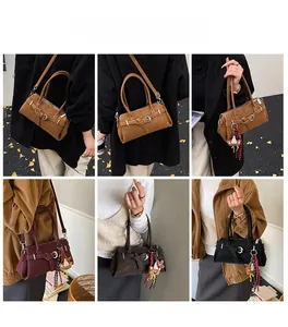 Detail view of stylish baguette bags in various colors with metallic chain straps