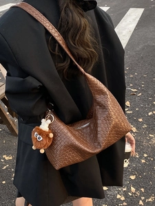 Fashion dark brown woven leather hobo tote bag with a cute bear charm for women