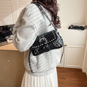 Black punk style baguette bag with silver rivets and metal buckle detail for women