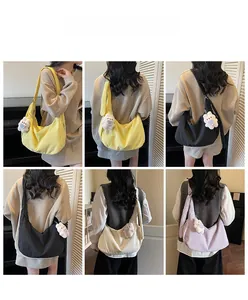 Detail shots of minimalist crescent crossbody bags in yellow, black, cream, and purple colors