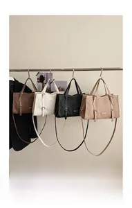 Detailed view of four retro pleated tote bags in coffee, cream, black and khaki colors