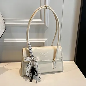 Women French Niche PU Leather Shoulder Bag Elegant Minimalist Underarm Bag With Ribbon Bow Metal Bead Pendant Daily Handbag