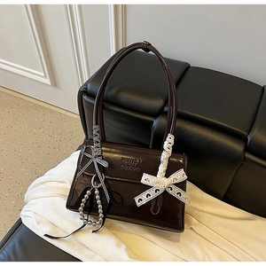 French retro dark brown glossy patent leather handbag with lace bow and bead chain
