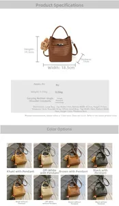 Close-up of woven PU leather texture and shoulder strap on a bucket bag