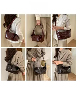 Close-up of vintage pleated hobo bag featuring retro leather texture and half-moon silhouette