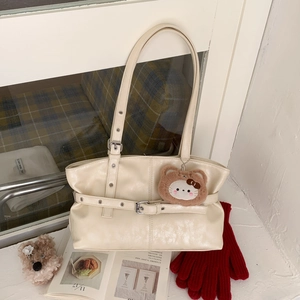 Cream vintage oversized faux leather shoulder bag with cat plush charm and metal buckle