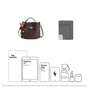 Macro view of dark brown leather bucket bag showing spacious interior for iPad and daily items