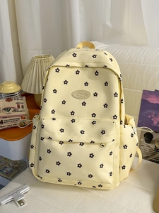 Minimalist cream backpack with small flower pattern for students and casual use