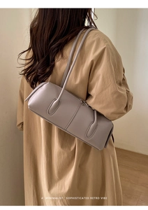 Detailed view of lavender retro tote bag with minimalist leather texture and shoulder straps