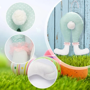 Detail view of Easter bunny leg hanging ornament with green polka dots and lace