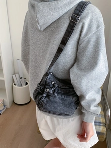 Vintage washed black denim crossbody bag with multi-zipper pockets and adjustable strap