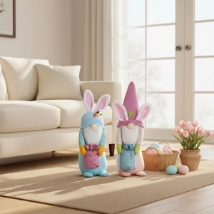 Detail of Easter gnome pair with knitted hats, bunny ears and carrot decorations