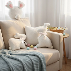Plush Easter bunny pillows in lamb wool on a sofa for cozy holiday home decoration