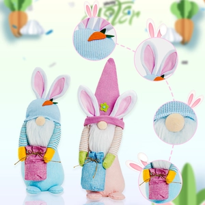 Detail of Easter gnome plush toys showing knitted hats with bunny ears and burlap bags
