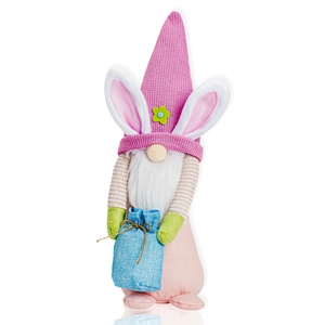 Close-up of Easter gnome with pink knit hat and rabbit ears holding blue burlap sack