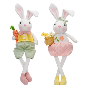 Easter bunny dolls set with carrot and flower basket decorations in spring attire