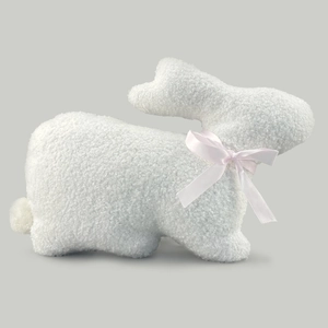 Plush white sherpa fleece Easter bunny pillow with a soft pink silk bow tie decoration