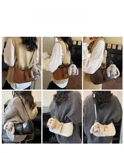 Detailed views of vintage style underarm bags in four colors with cute bunny charms