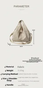 Detailed dimensions of beige canvas tote bag showing 36x14x23cm size and strap length