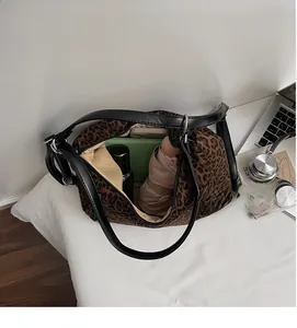 Leopard print tote bag interior showing large capacity for laptop and daily essentials
