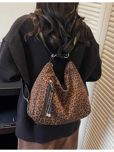 Leopard print canvas crossbody bag with large capacity and adjustable leather strap