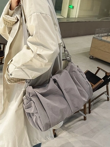 Minimalist grey pleated tote bag with large capacity and adjustable wide shoulder strap