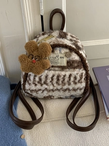 Brown and white striped plush backpack for women with bear pendant and leather straps