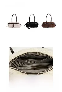 Detail view of plush faux fur tote bag colors and interior striped lining with zip pocket