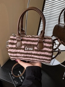 Pink and brown striped plush cylinder handbag with leather handles and Lume logo
