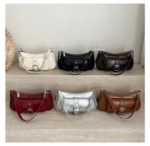 Detailed display of vintage Y2K baguette bags in six colors with metallic buckle accents