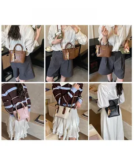 Detail view of mini retro bucket bags with pearl charms and adjustable crossbody straps