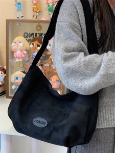 Versatile black matte hobo bag for women with large capacity and logo detail