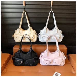 Detailed view of vintage multi-pocket motorcycle bags in four chic colors for women