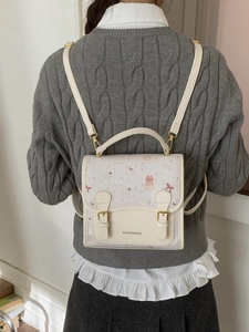 Cute white cartoon bear backpack with dual straps for students in a trendy preppy style