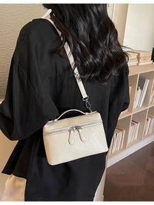 Minimalist beige textured square handbag for women with silver strap and top handle