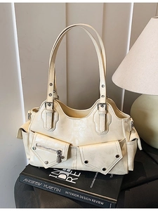 Cream white urban retro shoulder bag with rivet accents and functional pockets