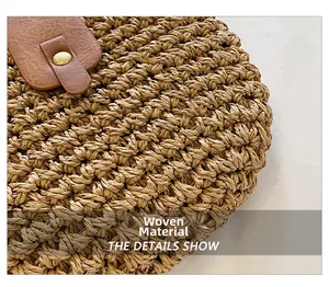 Macro shot of woven straw texture with brown leather strap and brass button detail