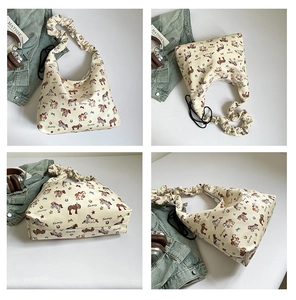 Detail view of canvas tote bag featuring cartoon horse print and ruffled shoulder strap