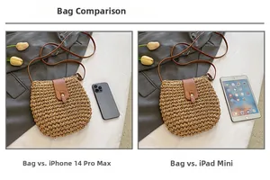Close-up of woven straw crossbody bag showing size comparison with a smartphone