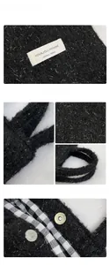 Detail of black knit tote bag with silver glitter thread and plaid lining texture
