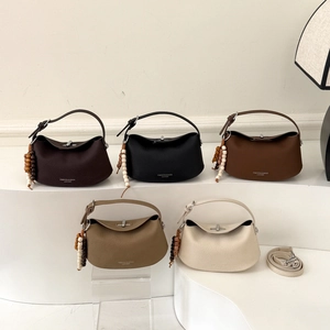 Minimalist leather handbags in five colors with wooden bead charms and long straps