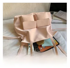 Pink tote bag interior showing spacious pockets for tablets and makeup accessories